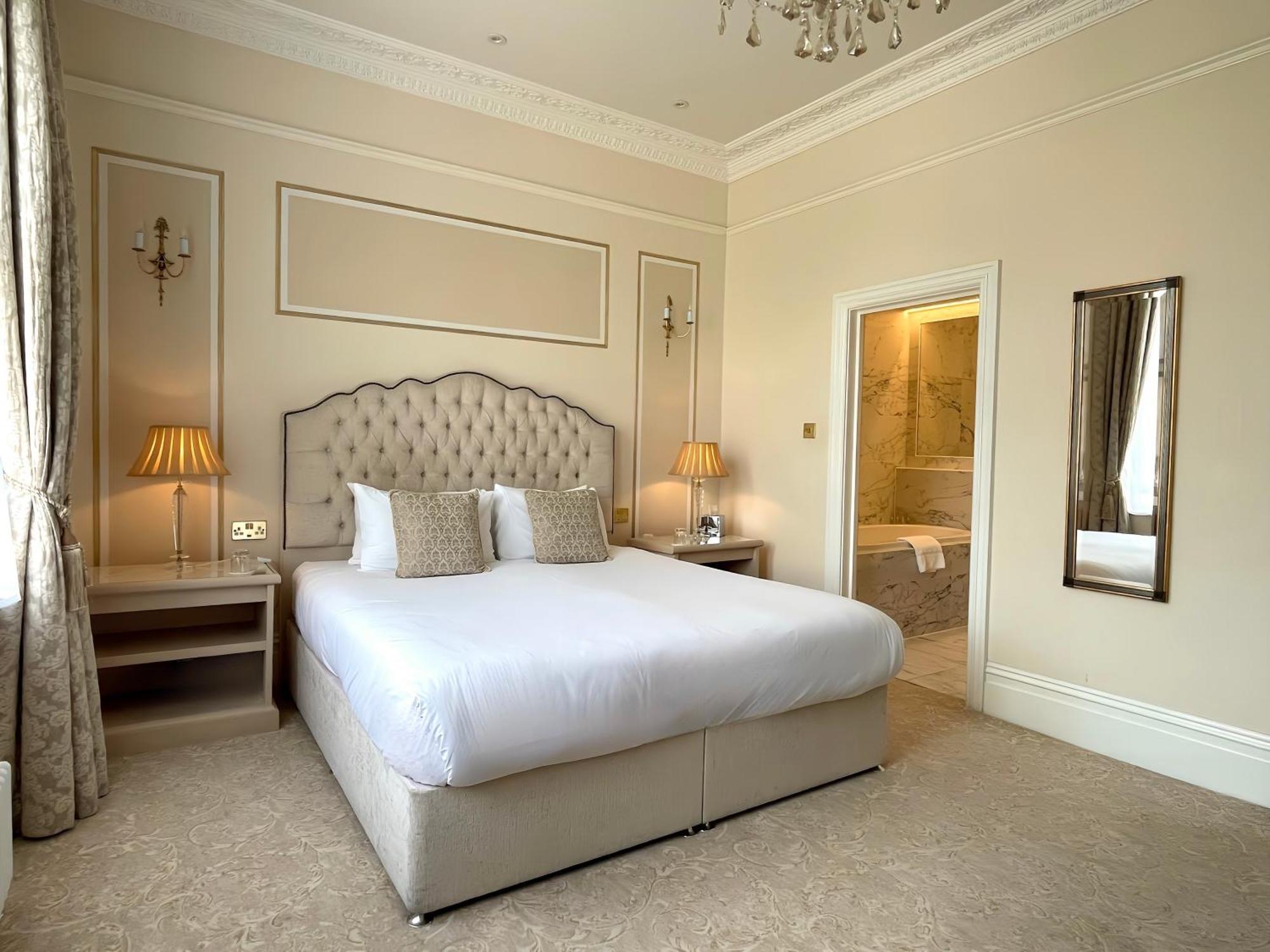 บาเดน เฮาส์ Hotel บาธ ห้อง รูปภาพ A bedroom at the hotel